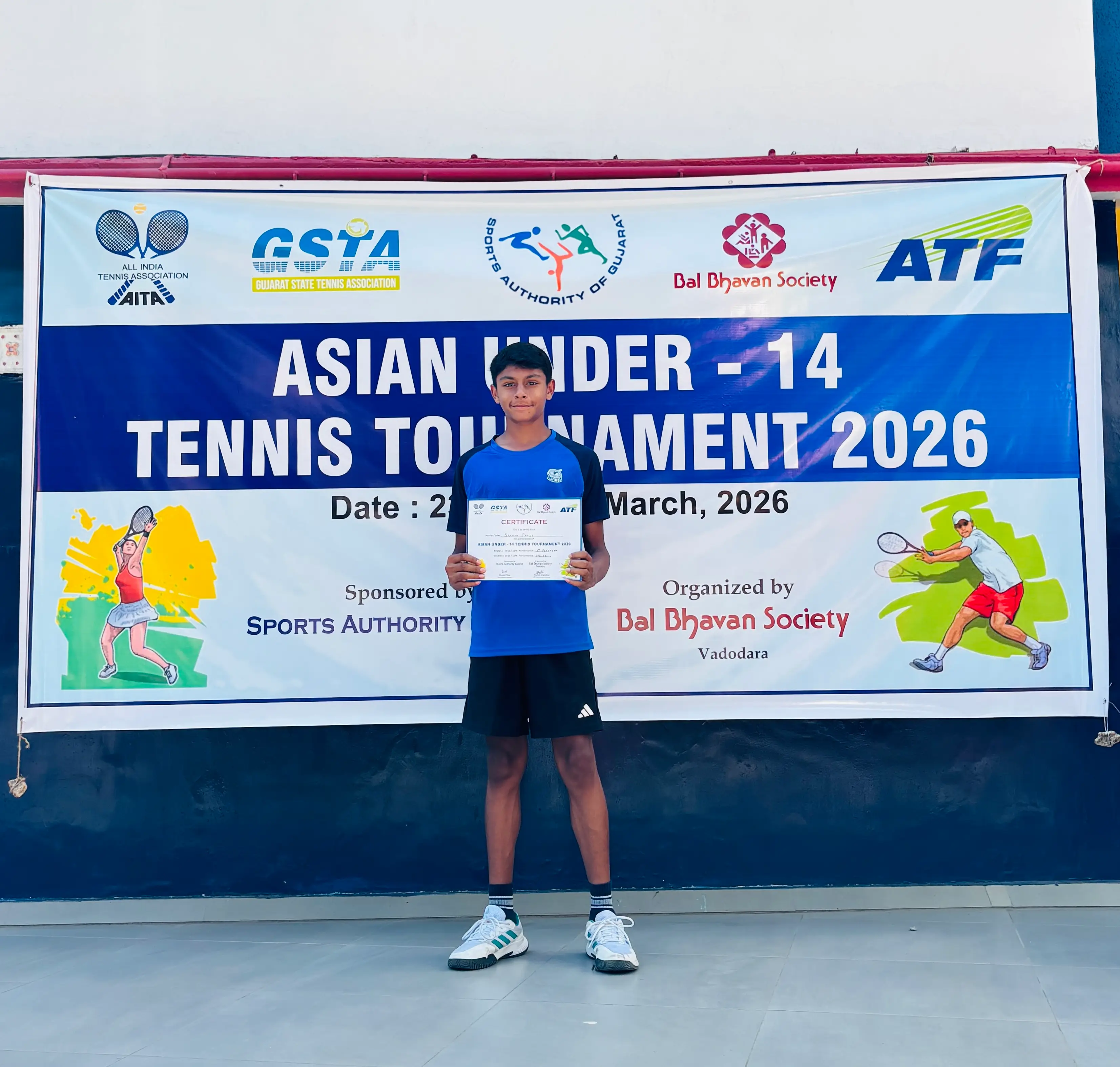 Sparsh receiving certificate for 3rd place in the Bal Bhavan Asian U-14 Tennis Tournament