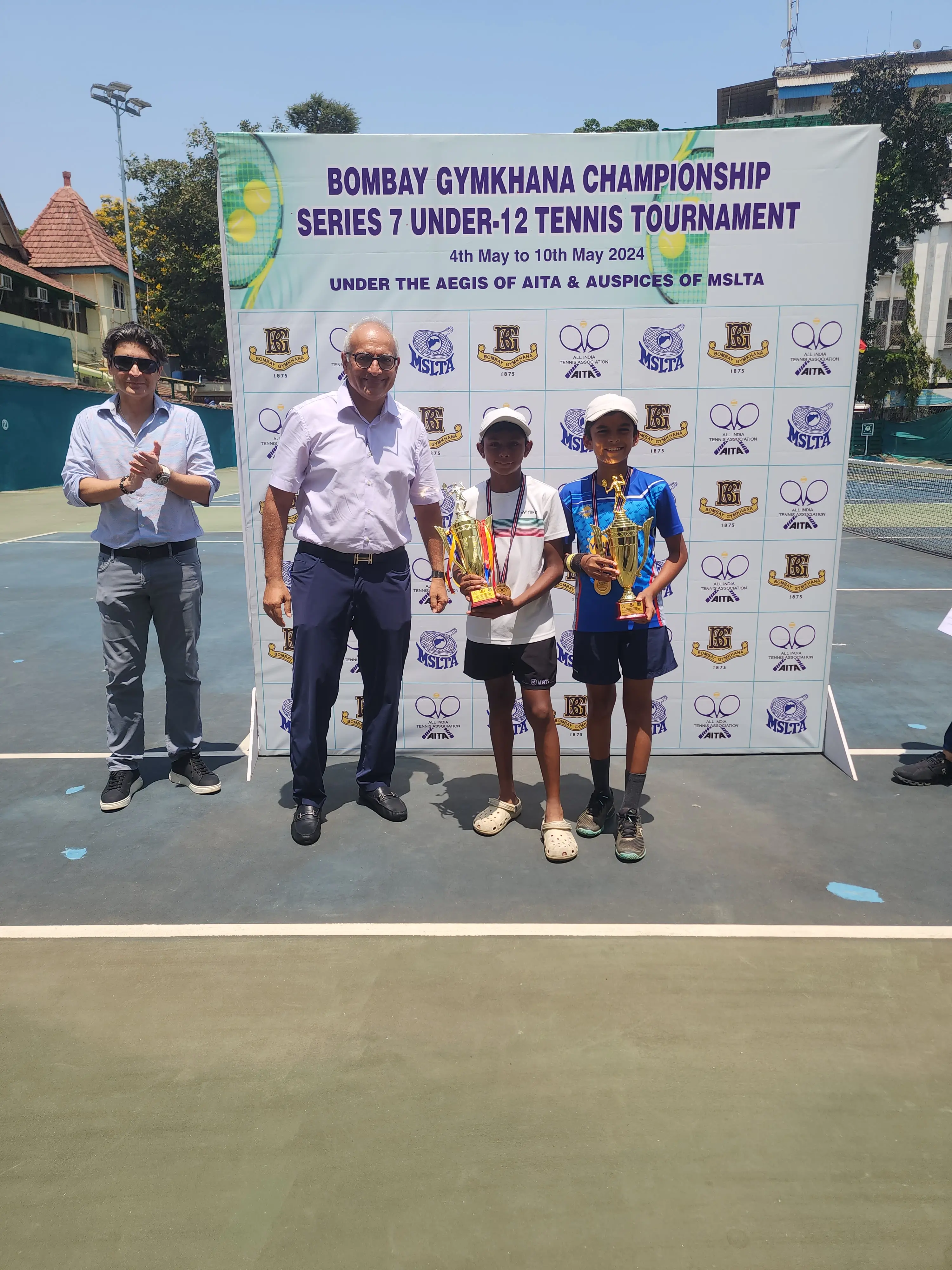 Sparsh receiving trophy for winning the singles and doubles at the Under 12 Championship Series (CS7) 2024 - Bombay Gymkhana