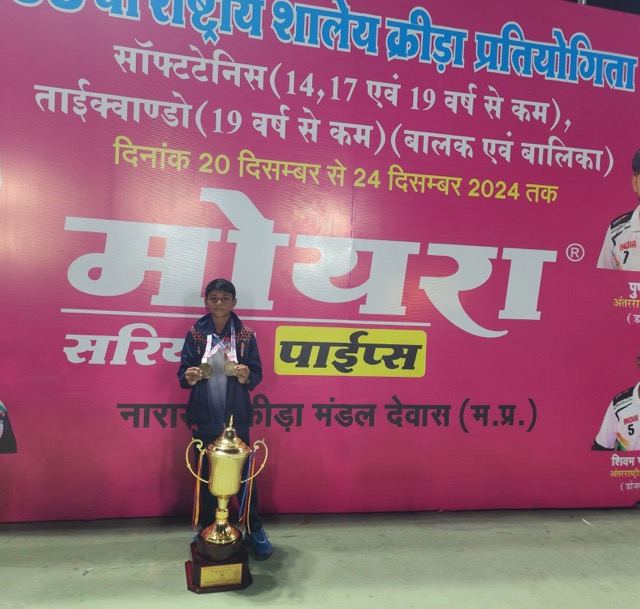 Sparsh receiving trophy for winning the National School Games held in Madhya Pradesh